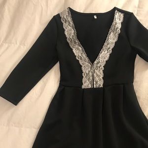 Medium Black cocktail dress with white lace detail